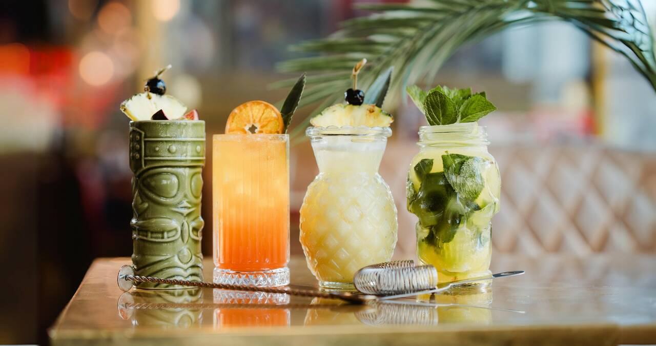 Tropical cocktail selection on table