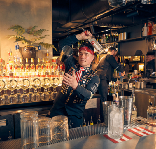 Barman making cocktail