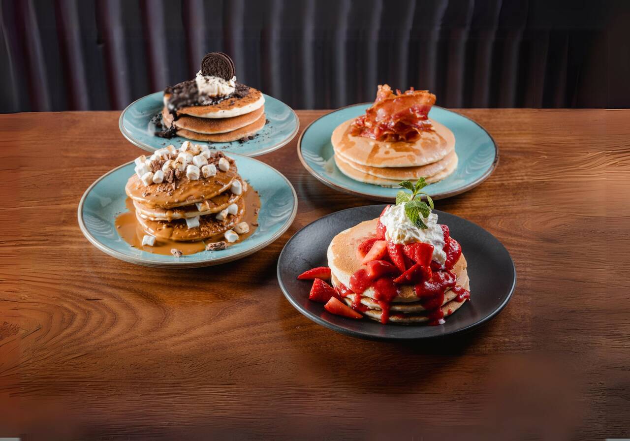 Pancake stacks with different toppings 