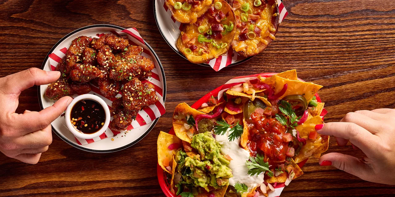 Selection of appetizers with hands