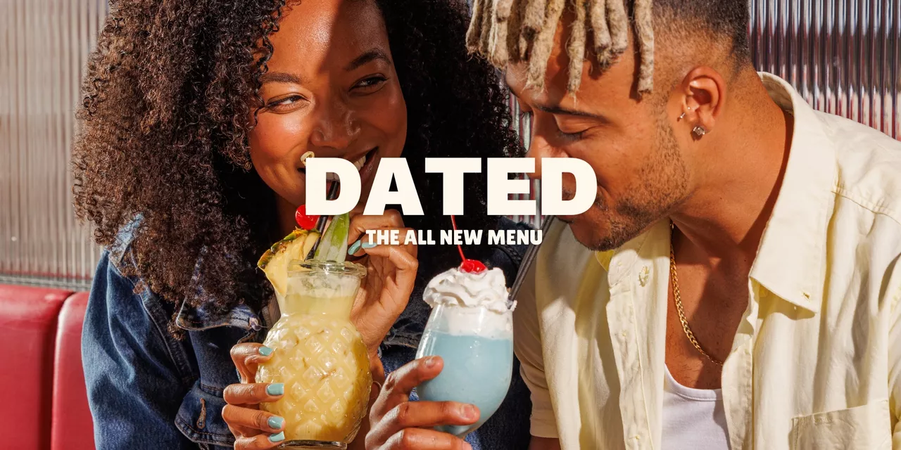 Couple at table with drinks