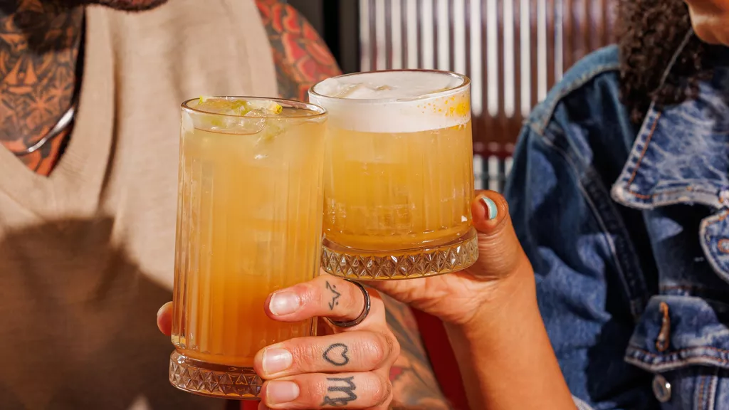 Friends sharing drinks