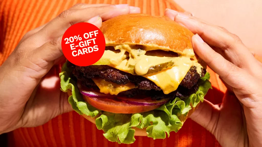 Woman holding a burger