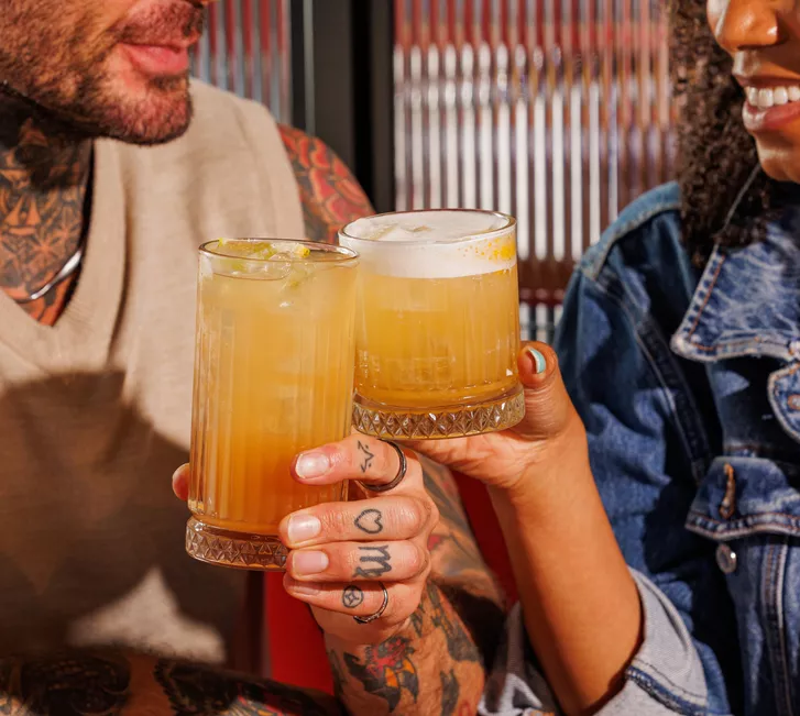 Couple at table with drinks