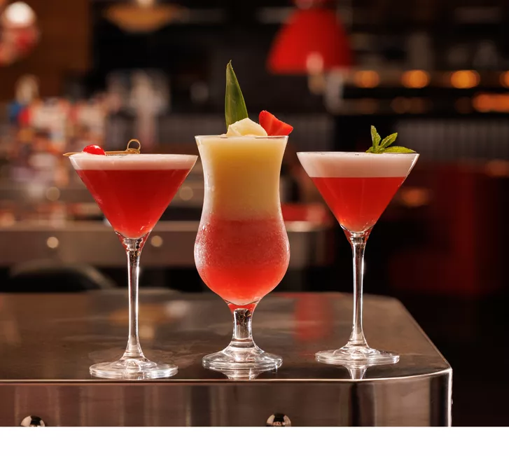 Three cocktails on counter